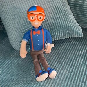 Talking Blippi doll, approximately 16” tall